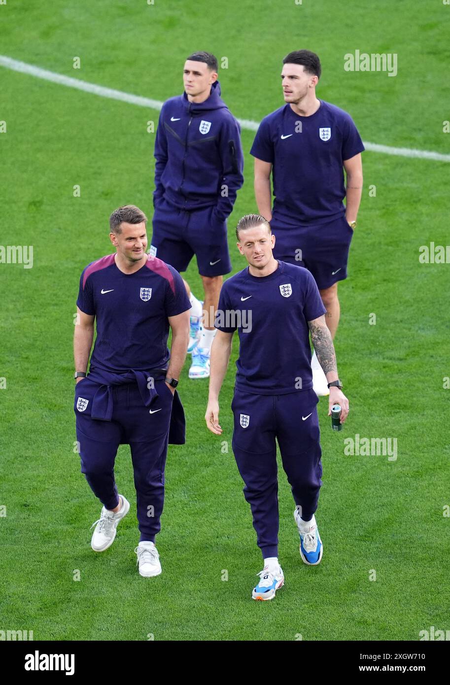 Jordan Rice Declan England goalkeeper coach Tom Heaton (left), Phil Foden, goalkeeper ...
