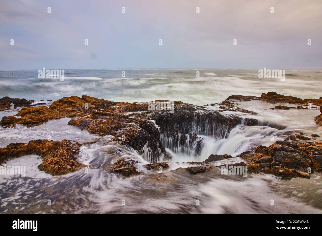 Tidal Motion at Thor's Well Oregon Low Perspective Stock Photo