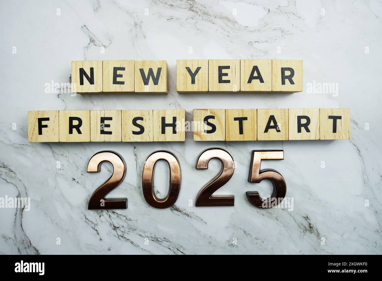 New Year Fresh Start 2025 text on marble background Stock Photo