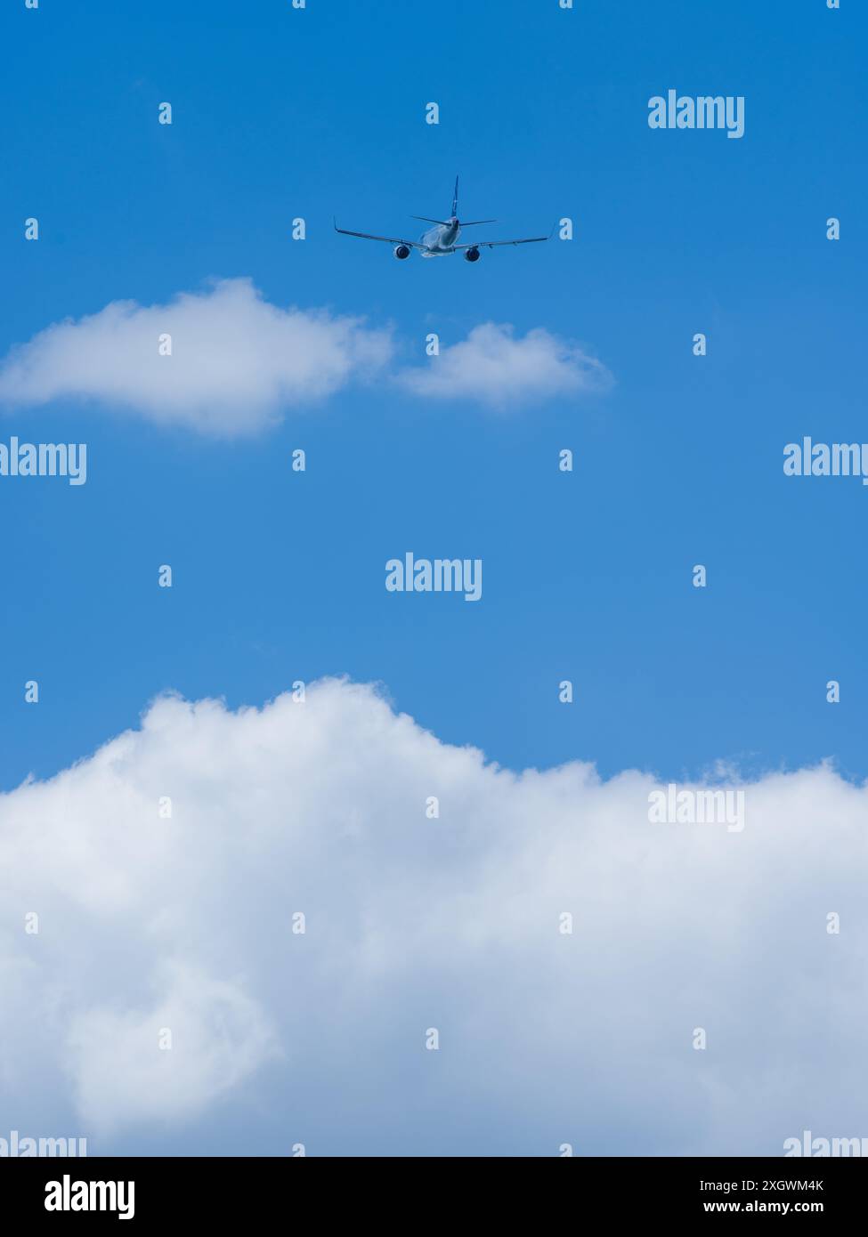 plane taking off against the background of clouds Stock Photo - Alamy