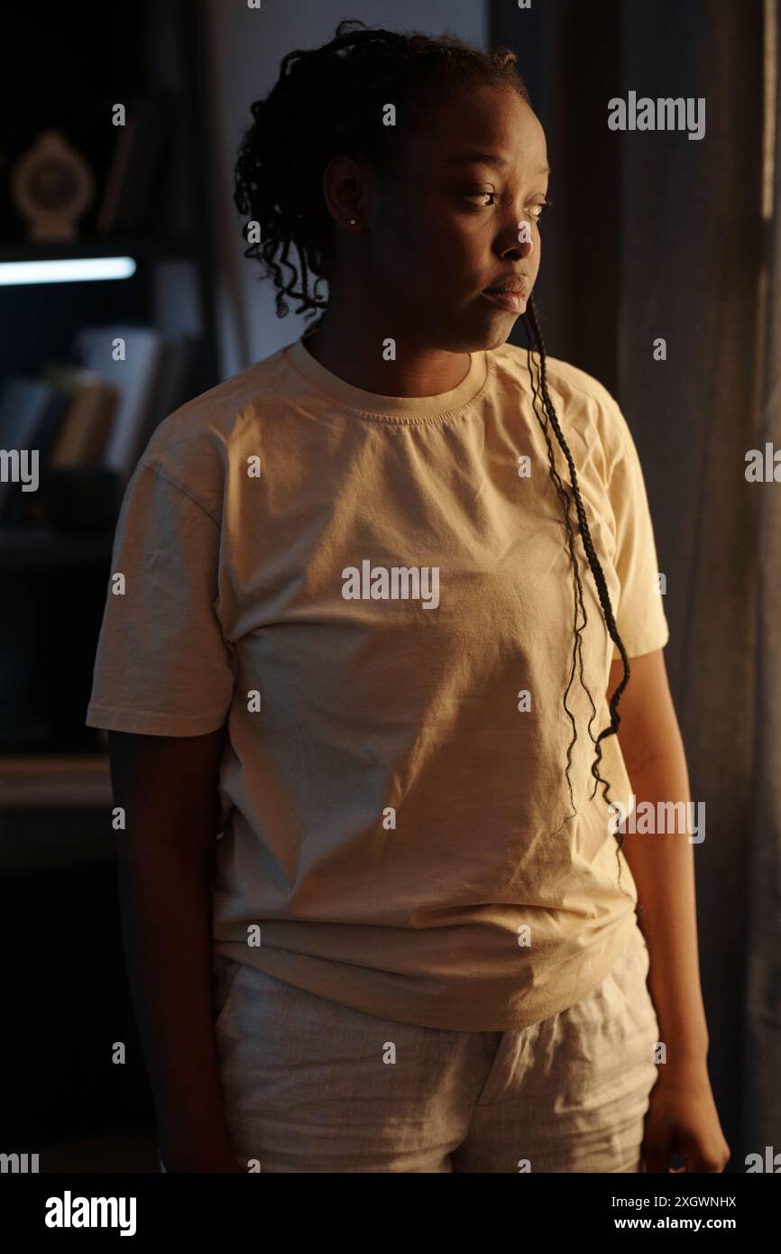 Woman sad window black hi-res stock photography and images - Alamy
