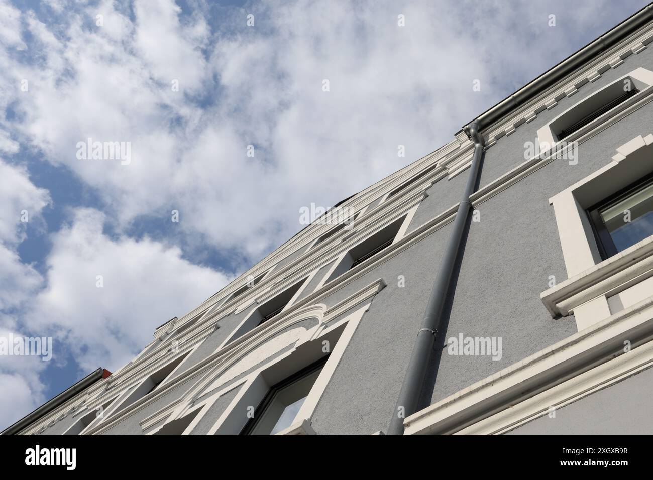 Residential building, light grey with white ornaments, extreme frog ...