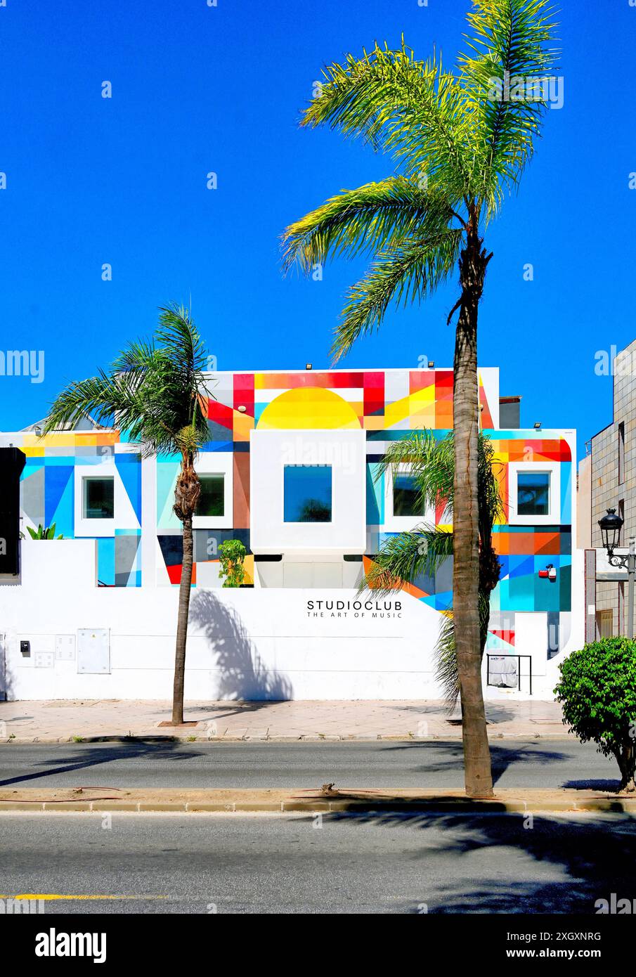 An art deco style colourful building Studioclub art and music