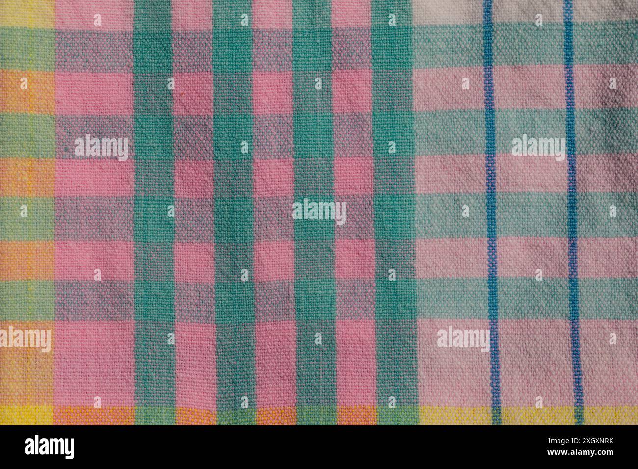 pink, teal, yellow plaid gridded textile napkin, tablecloth Stock Photo