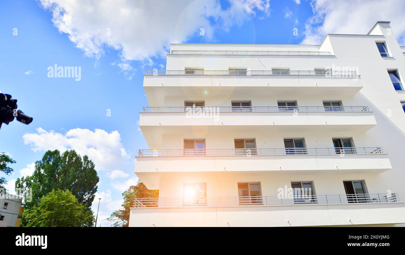 View of Modern residential building with new apartments in a green residential ...