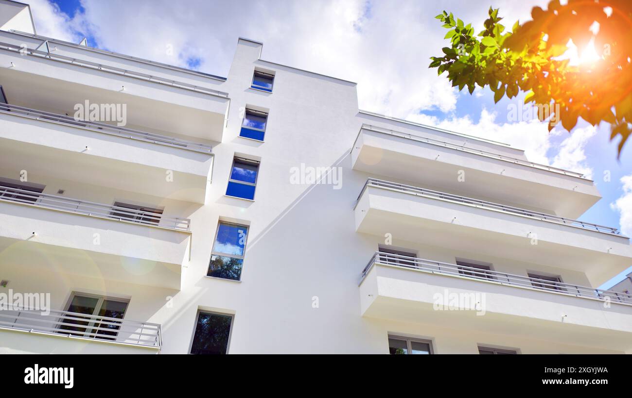 Image showcasing Modern residential building with new apartments in a green residential ...