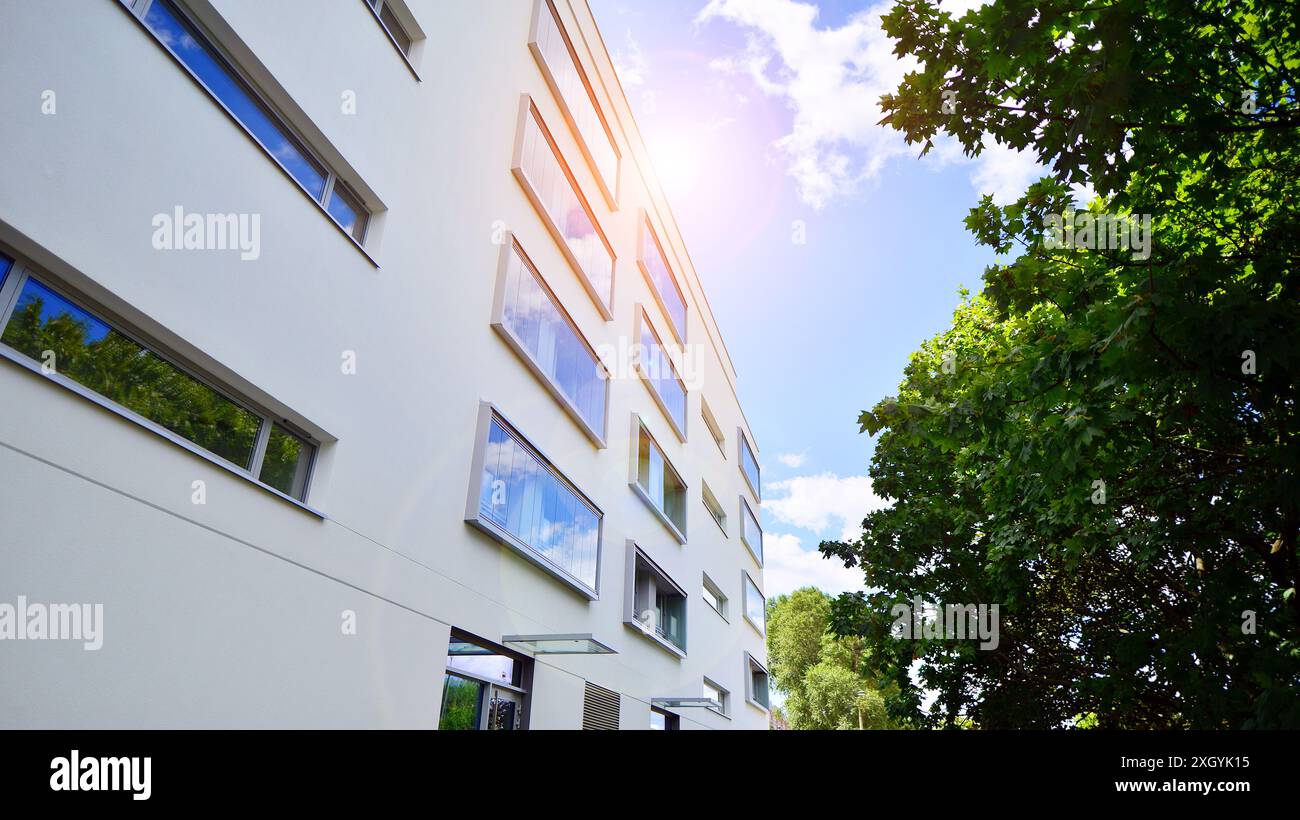 Modern residential building with new apartments in a green residential ...
