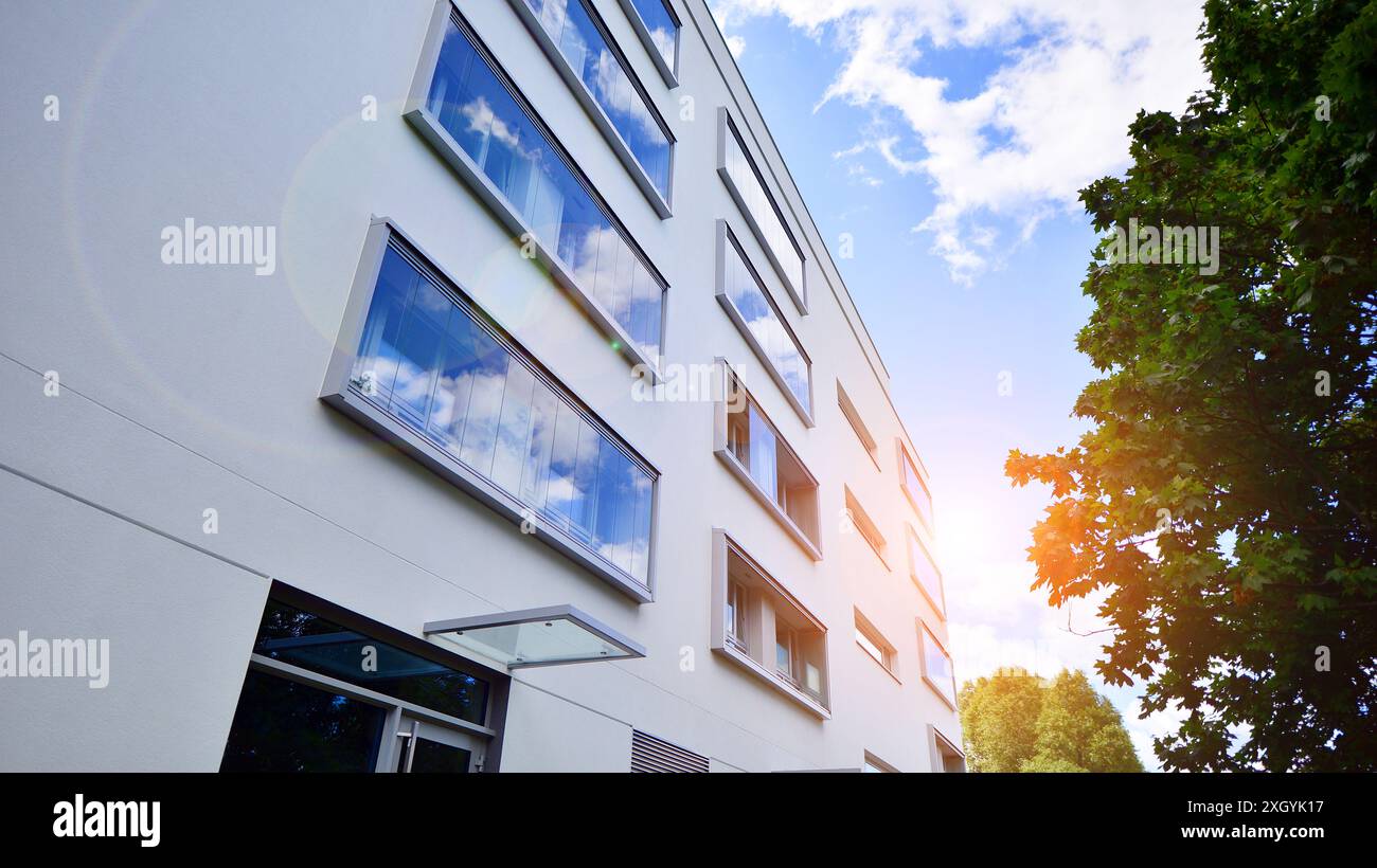Modern residential building with new apartments in a green residential ... - Green Building Condo Developments With Private Music Rooms