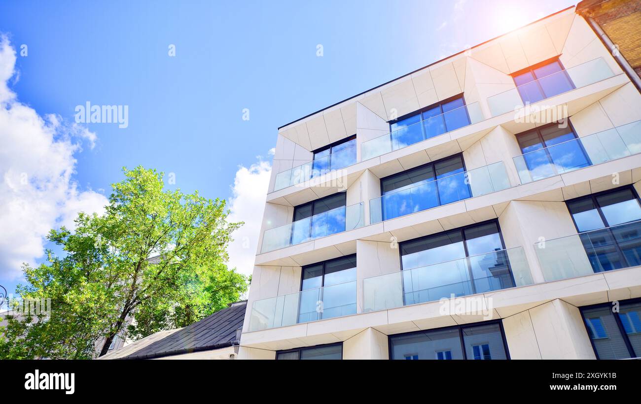 Modern residential building with new apartments in a green residential ...