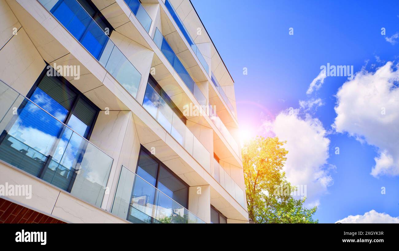 Modern residential building with new apartments in a green residential ...