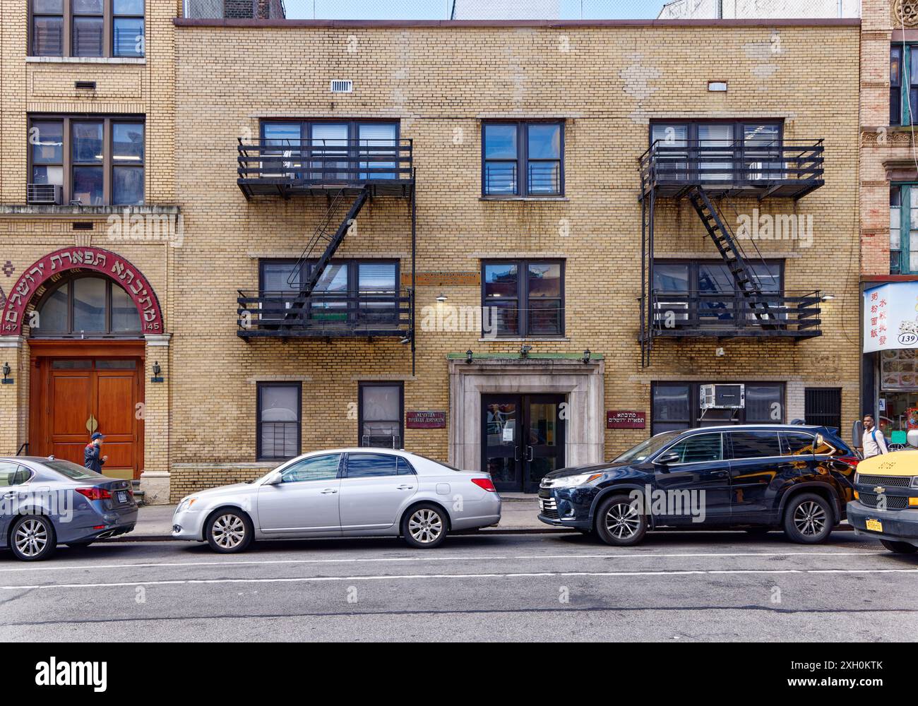 NYC Chinatown: Mesivtha Tifereth Jerusalem, an Orthodox Jewish Yeshiva (parochial school), a remnant of Chinatown’s history as a Jewish enclave. Stock Photo