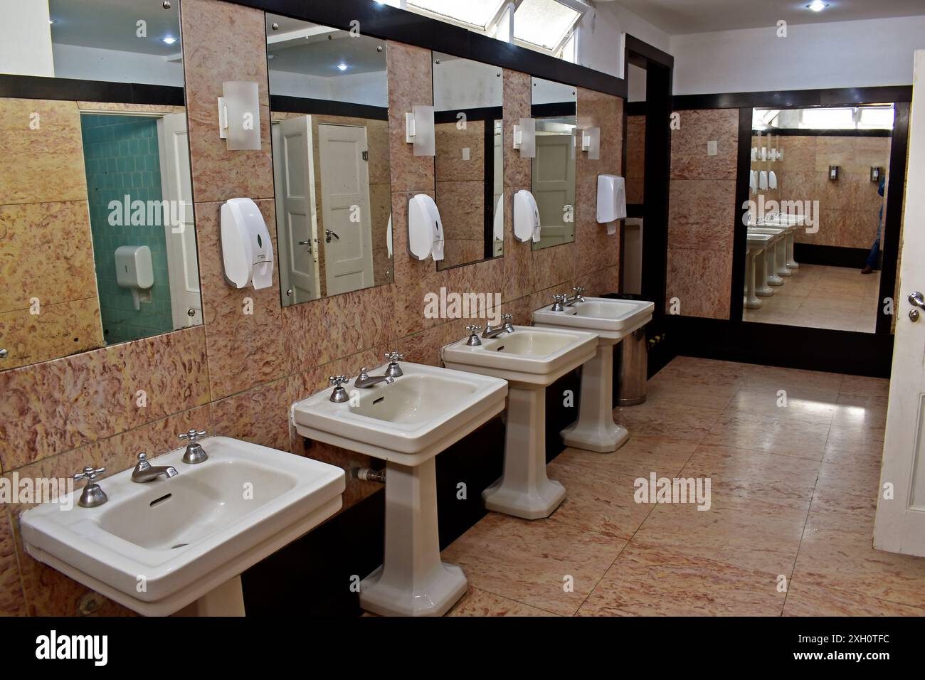 Hotel mens public restroom hi-res stock photography and images - Alamy, image size:1300x956