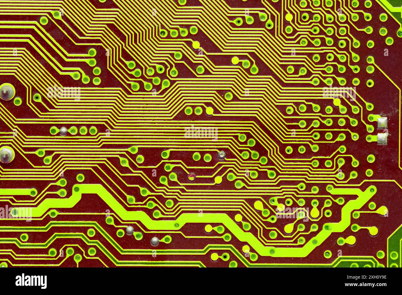 Macro image of a red printed circuit board. technology background Stock Photo