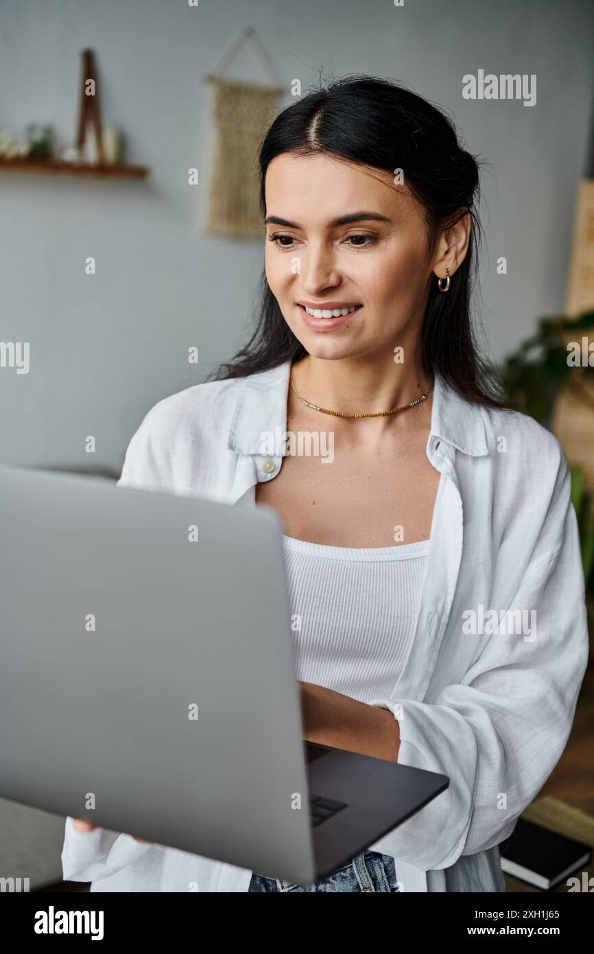 Focused professional woman sits hi-res stock photography and images - Alamy