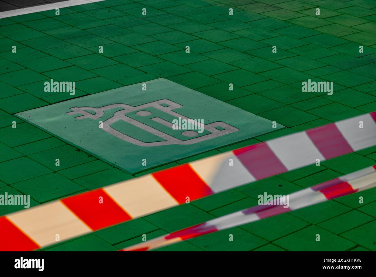 Construction of a charging station for electric cars in a shopping center, construction site for car chargers Stock Photo
