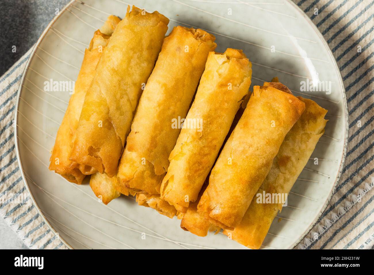 Deep Fried Filipino Pork Lumpia with Dipping Sauce Stock Photo