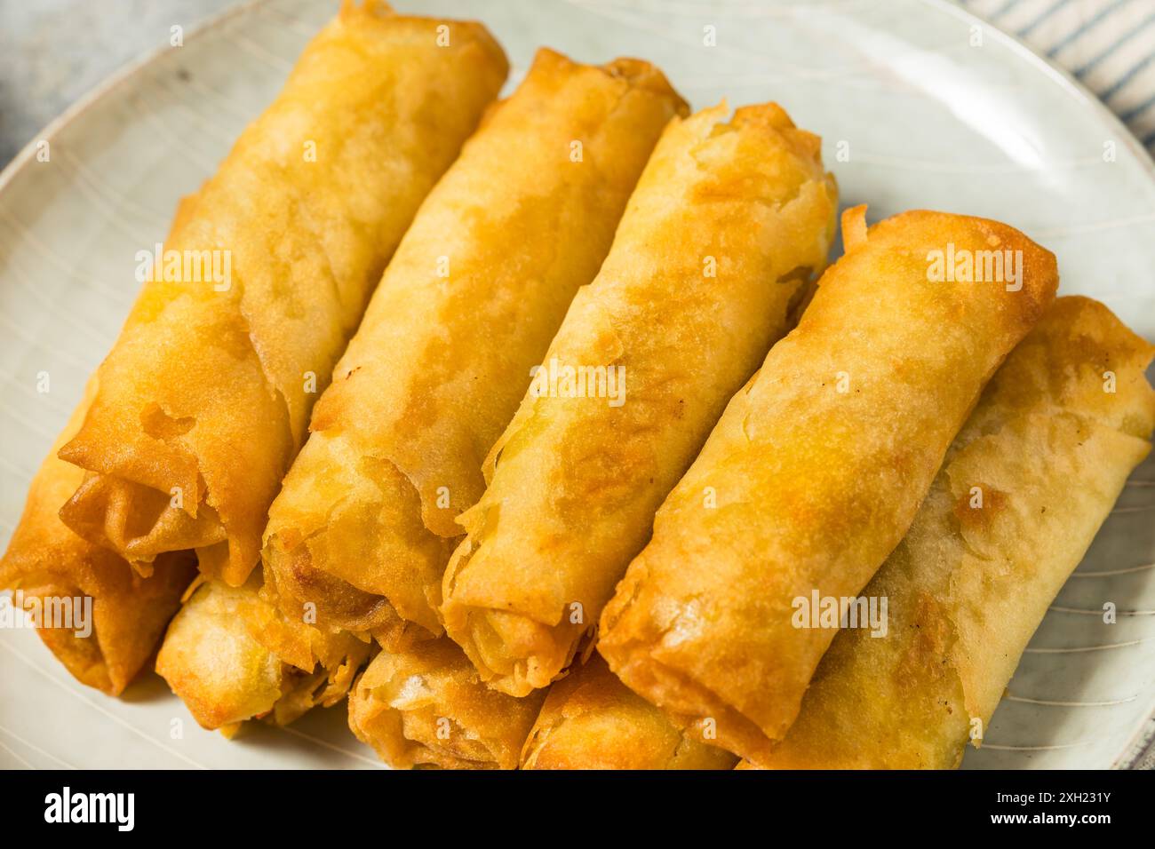 Deep Fried Filipino Pork Lumpia with Dipping Sauce Stock Photo