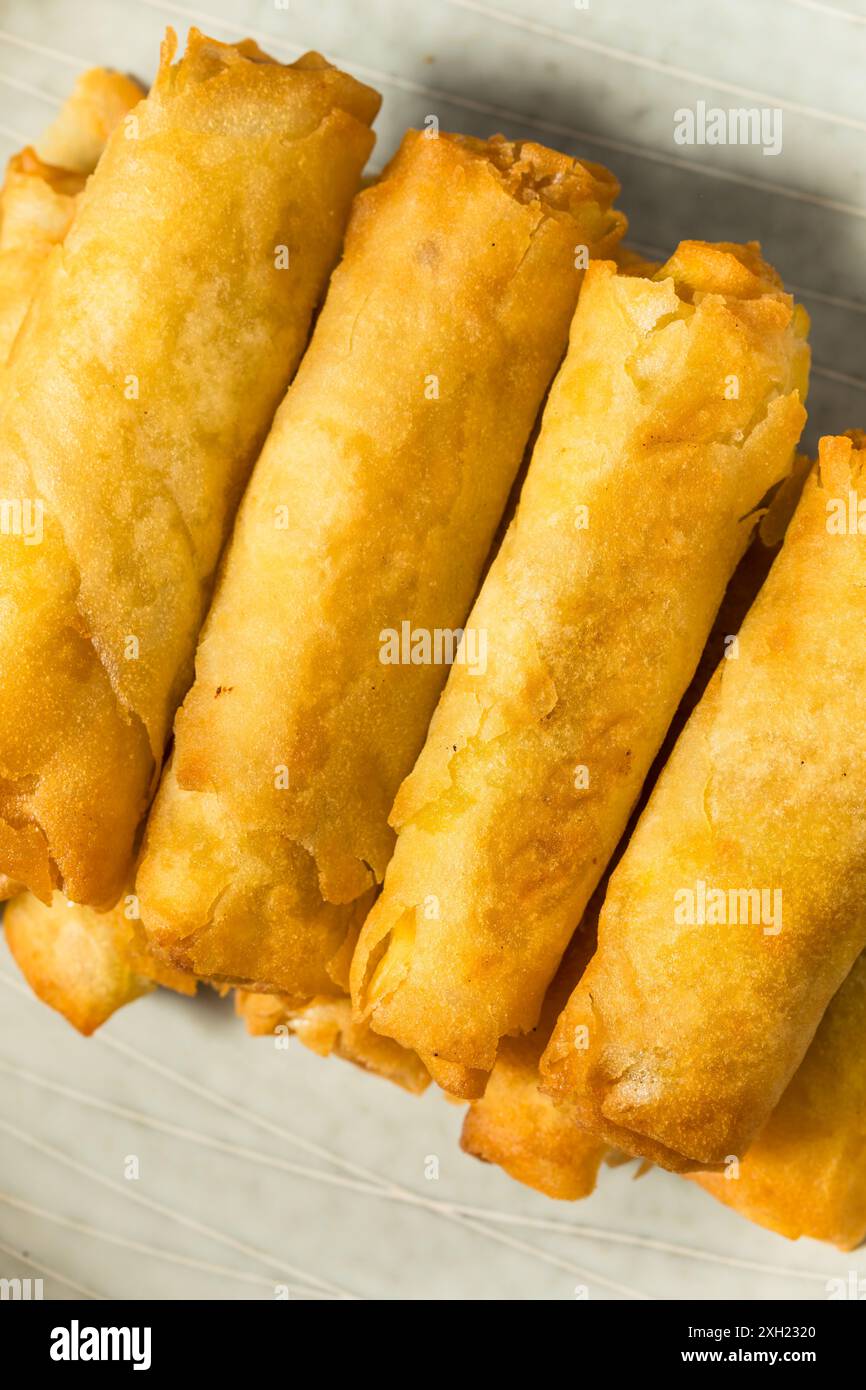 Deep Fried Filipino Pork Lumpia with Dipping Sauce Stock Photo