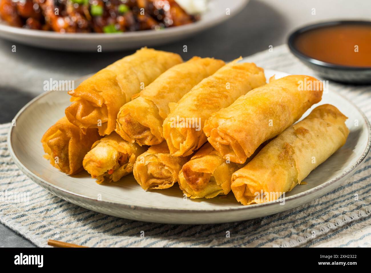 Deep Fried Filipino Pork Lumpia with Dipping Sauce Stock Photo
