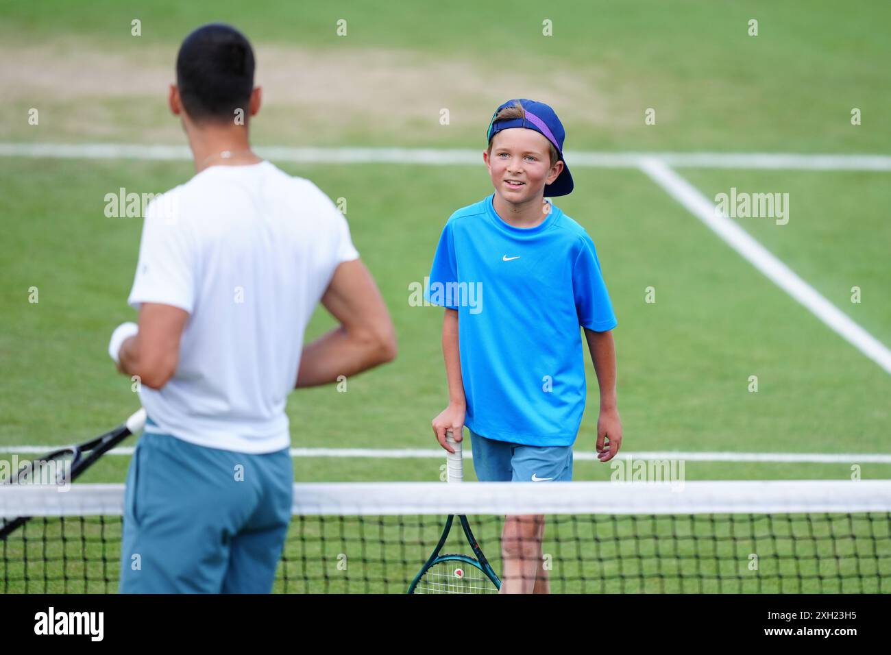 Novak Djokovic and his son Stefan on day eleven of the 2024 Wimbledon