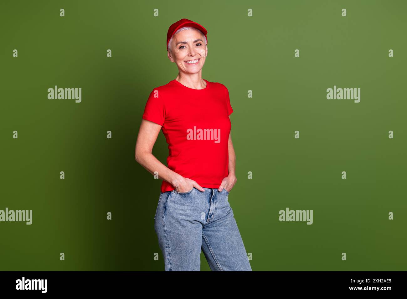 Photo of lovely pensioner lady delivery service employee confident pose ...