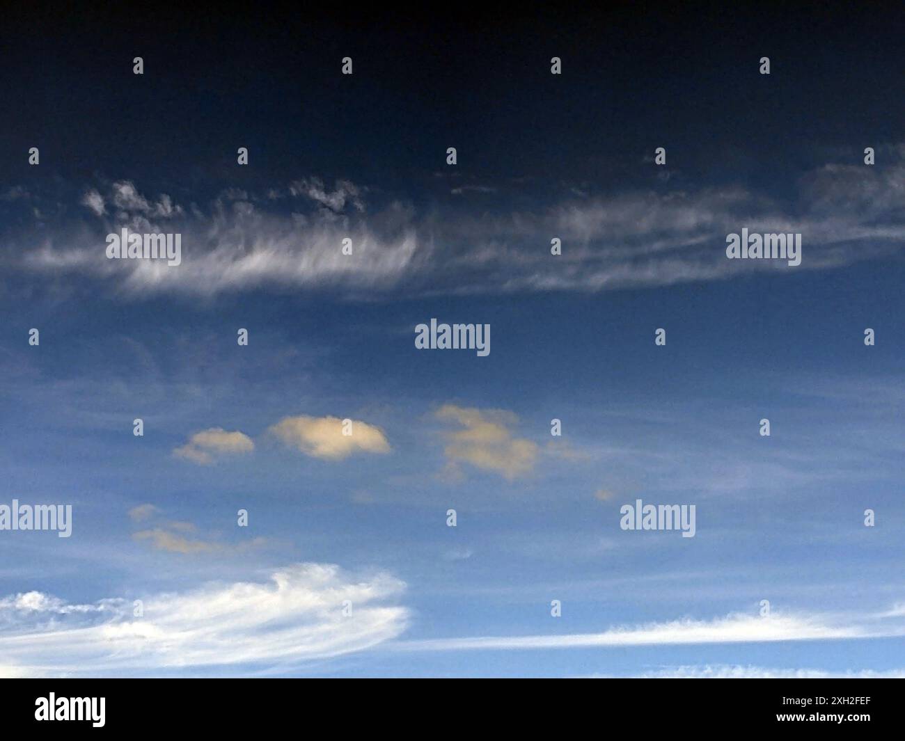 Fluffy White Clouds in a Blue Sky as A Skyscape Background Stock Photo ...