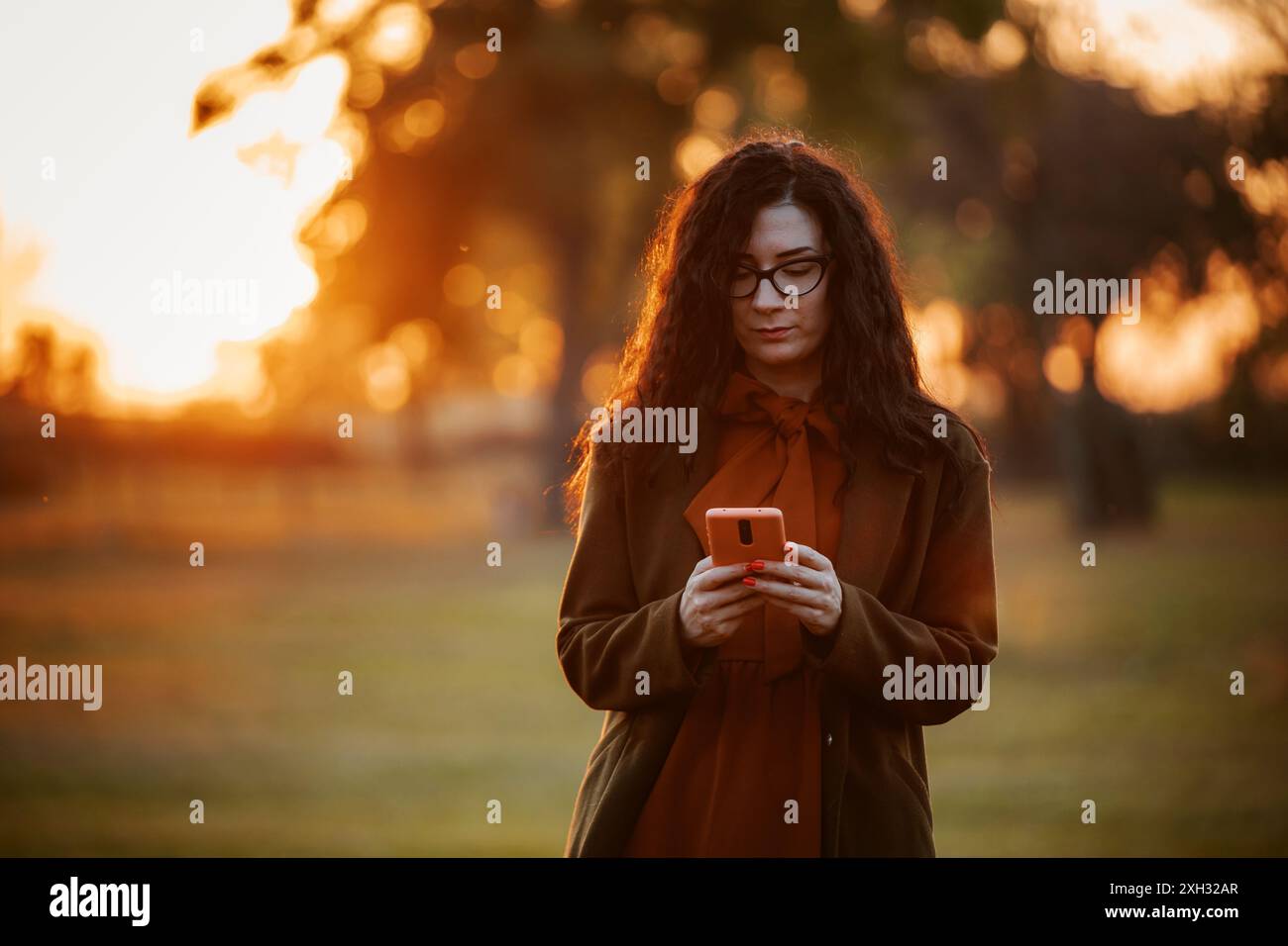 Woman long hair outdoors in hi-res stock photography and images - Alamy