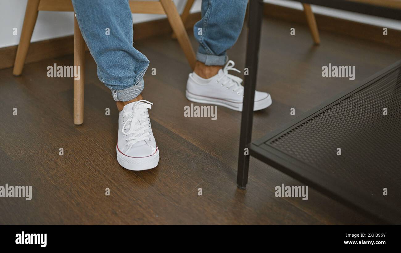 Man wearing jeans sneakers hi-res stock photography and images - Alamy