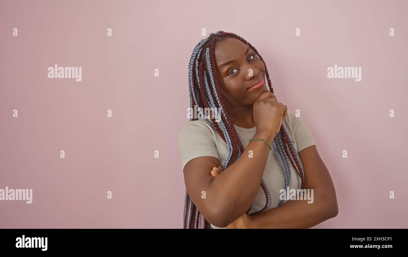 Woman beautiful braids stands hi-res stock photography and images - Alamy