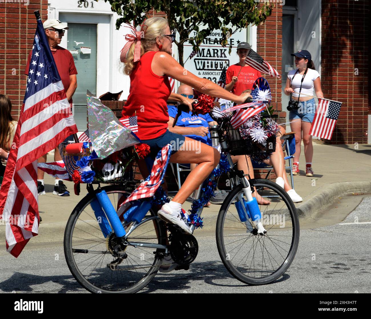 Participants in a Fourth of July street parade in downtown ...