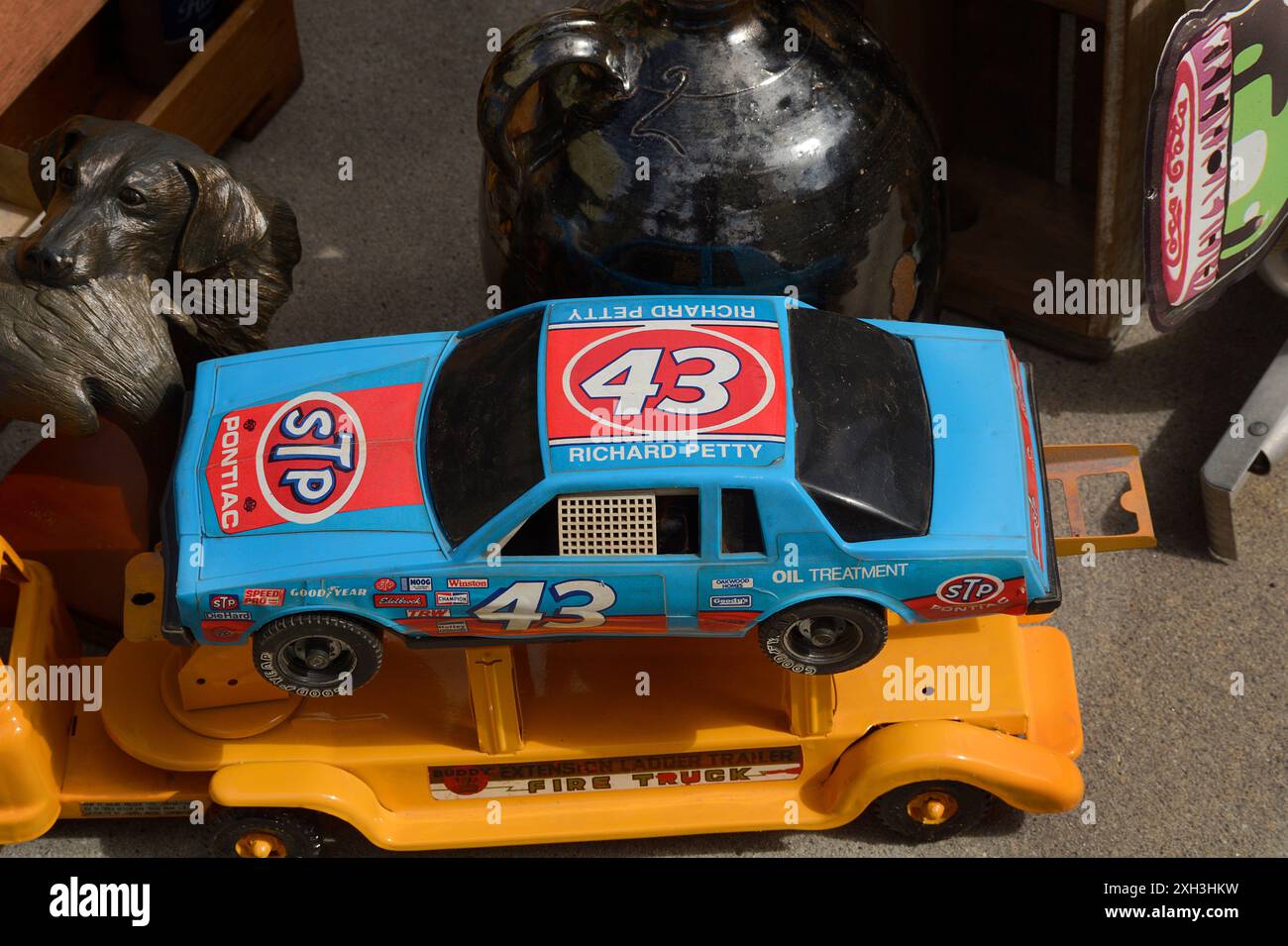 A collectible scale model of a stock car driven by NASCAR champion ...