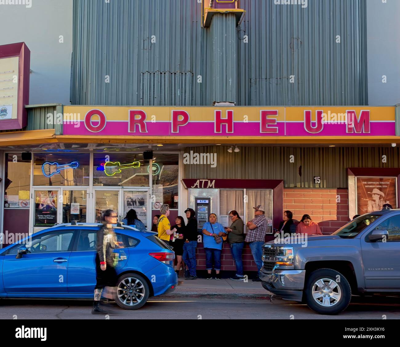 Concert fans line up in front of the Orpheum theater, originally a