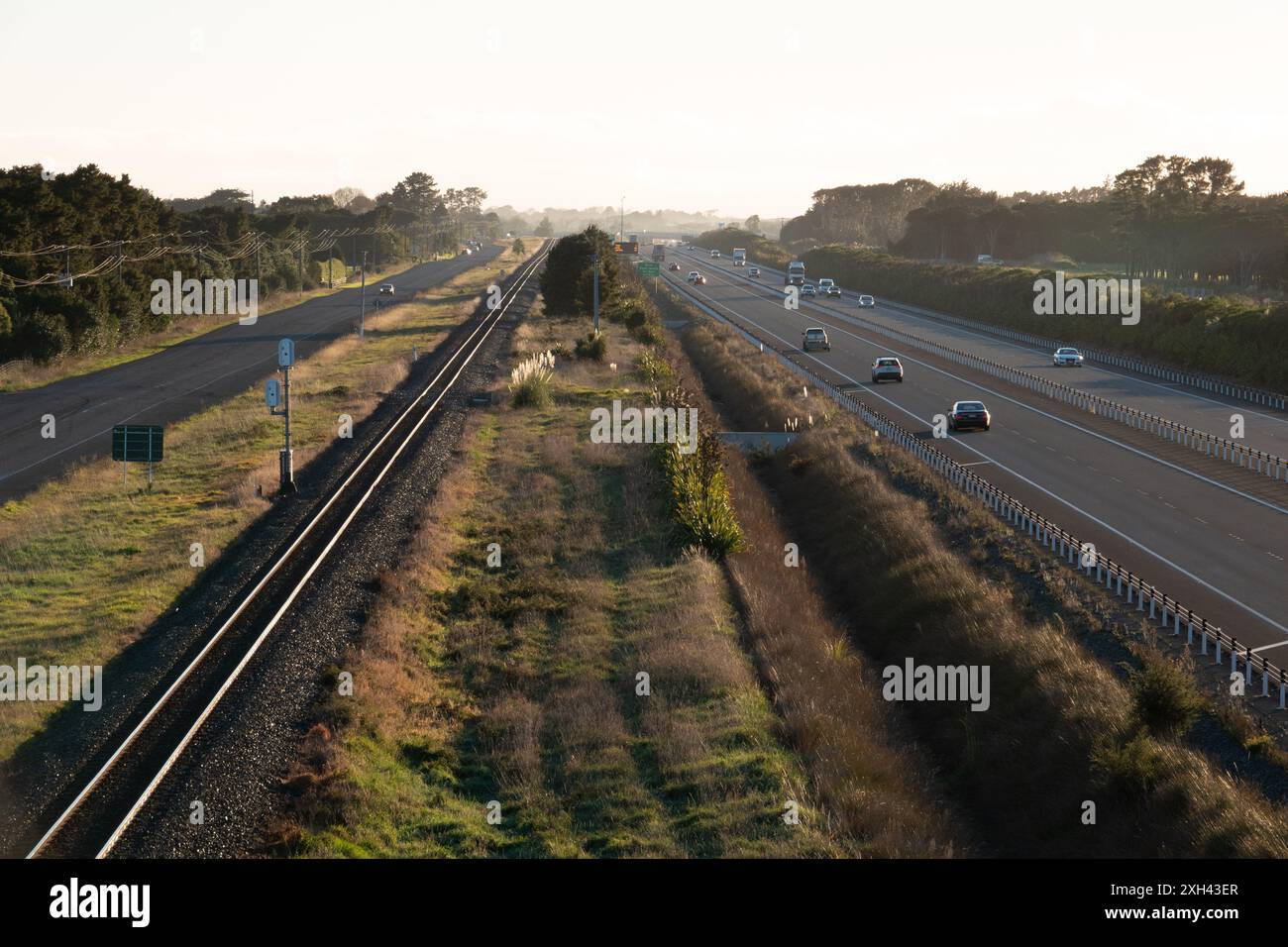 Traffic on Peka Peka to Otaki expressway, with train tracks and old