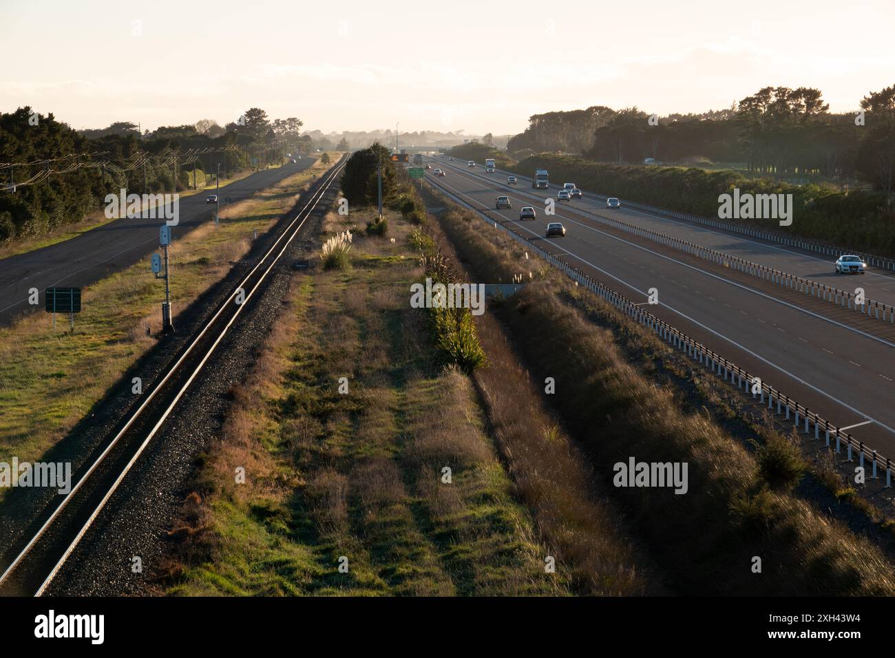 Traffic on Peka Peka to Otaki expressway, with train tracks and old
