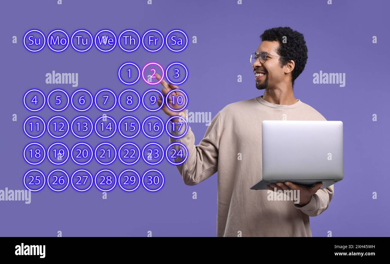 Making timetable. Man with notebook touching virtual calendar on dark violet background Stock Photo