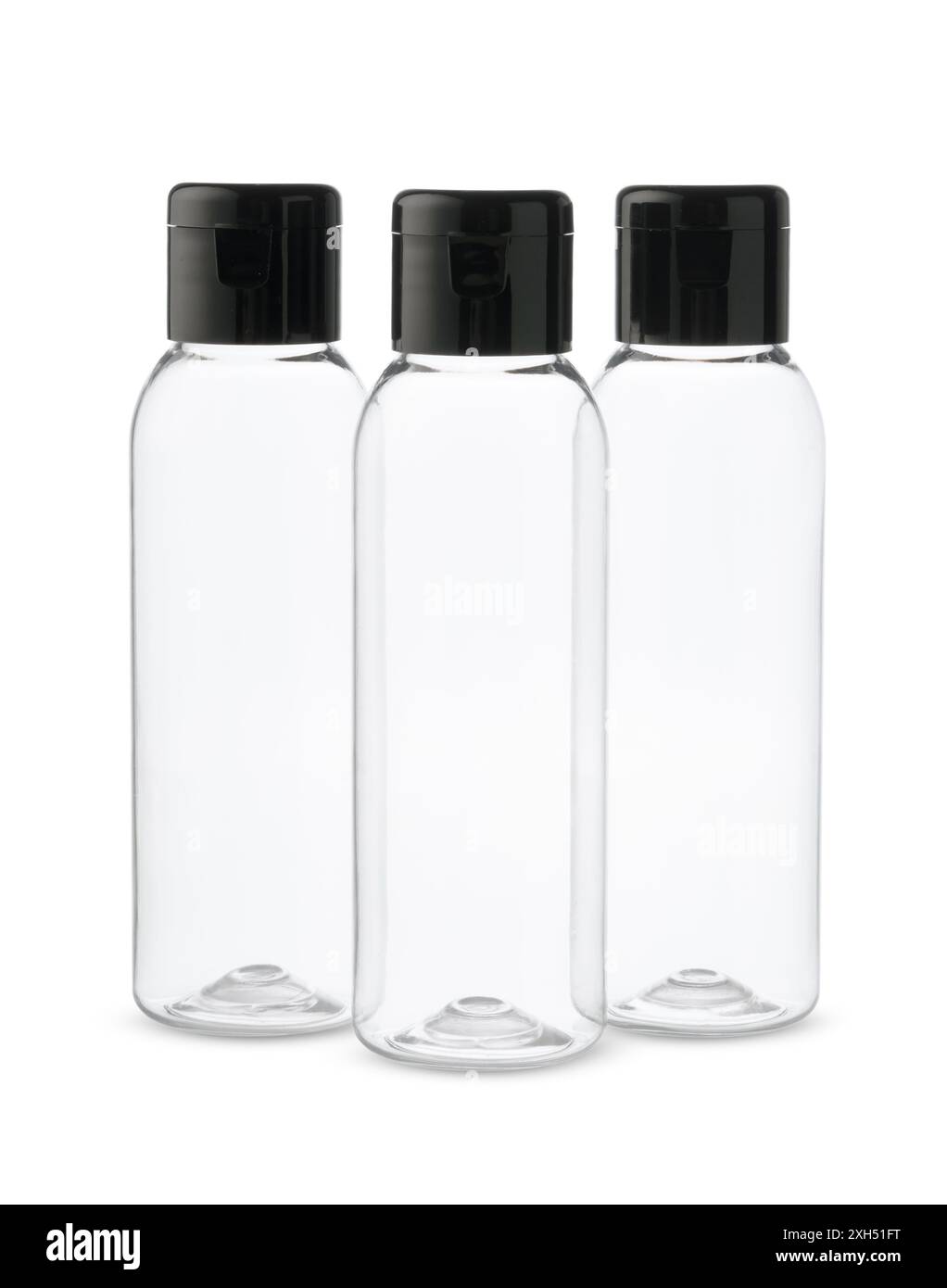 Three Clear Plastic Bottles With Black Caps on a White Background Stock ...