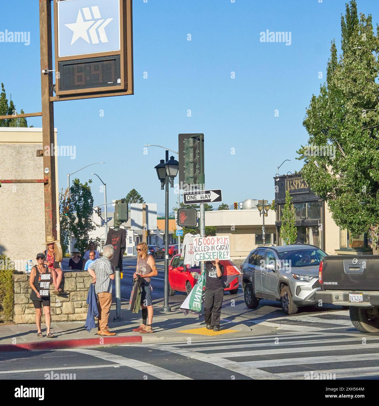 Protesters supporting Gaza and Palestine on a street corner in Sebastopol, California. Stock Photo