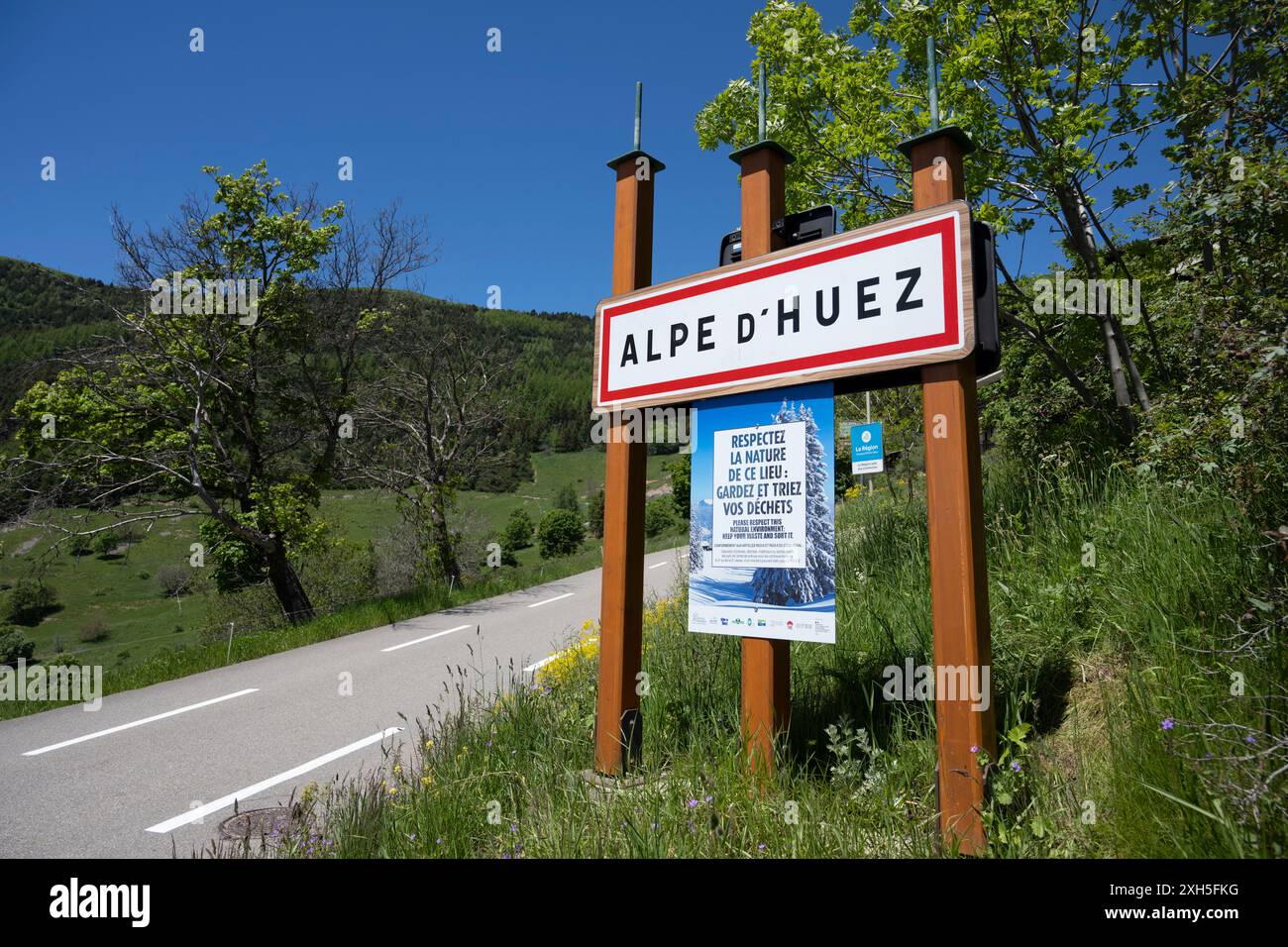 Entry sign to the community of Alpe d'Huez, French Alps Stock Photo - Alamy