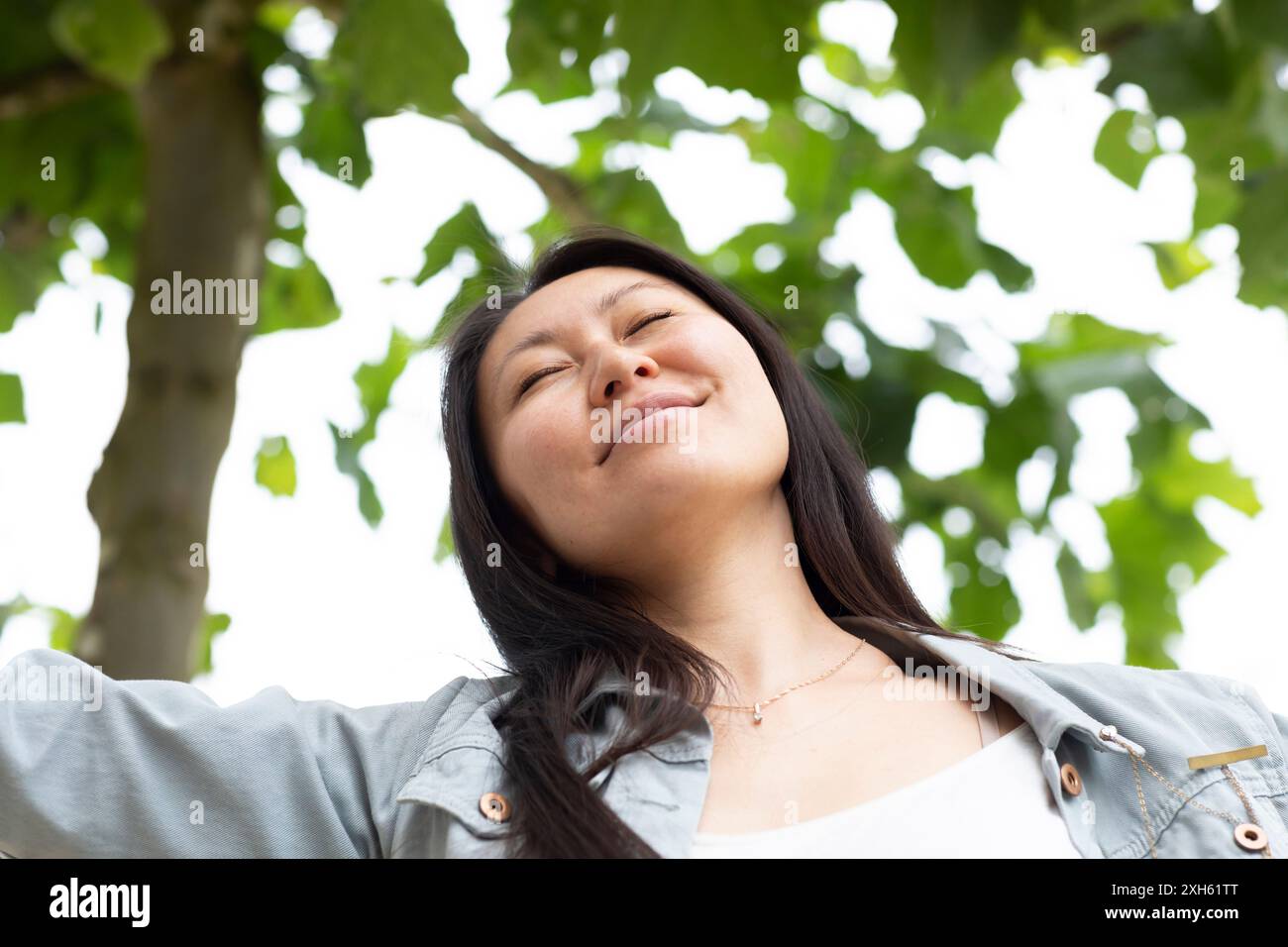Asian woman closed eyes hi-res stock photography and images - Alamy