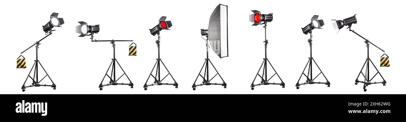 Photography studio flash on a lighting stand isolated on white ...