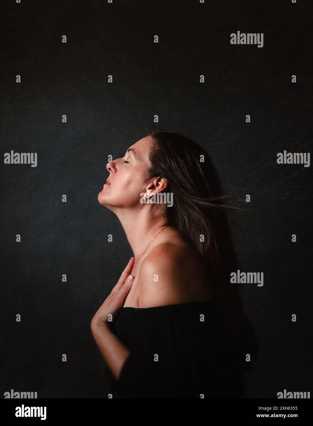 One woman breathe eyes closed hi-res stock photography and images - Alamy