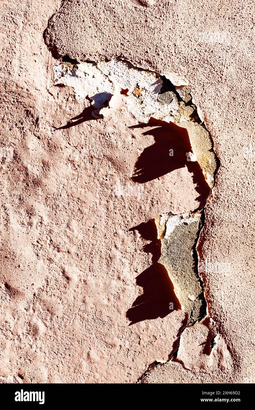brown wall peeling in Alhambra Stock Photo