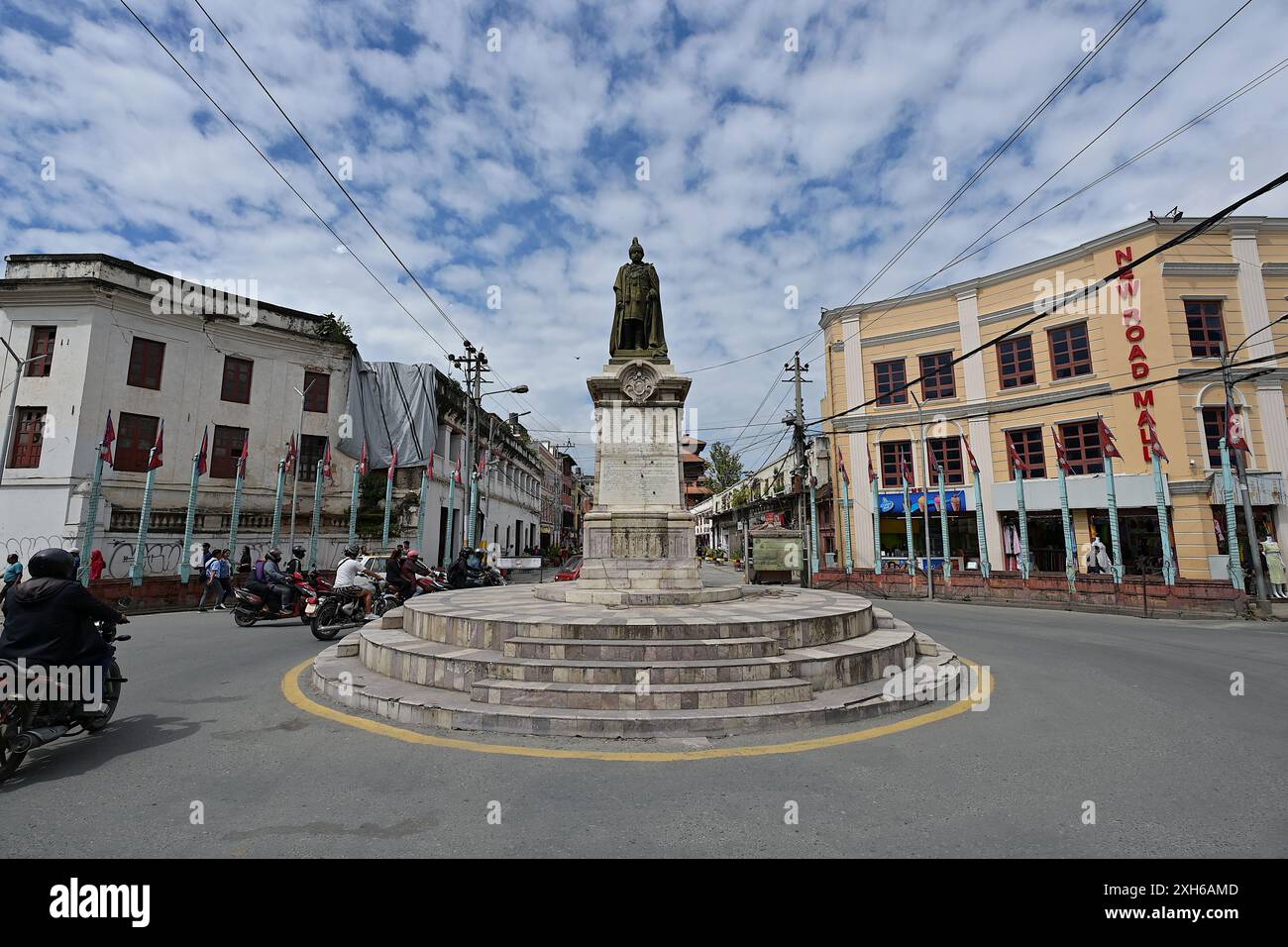 Statue of Juddha Shumsher Jung Bahadur at Juddha Salik, New Road, Kathmandu, Nepal, with Durbar Square in the background Stock Photo