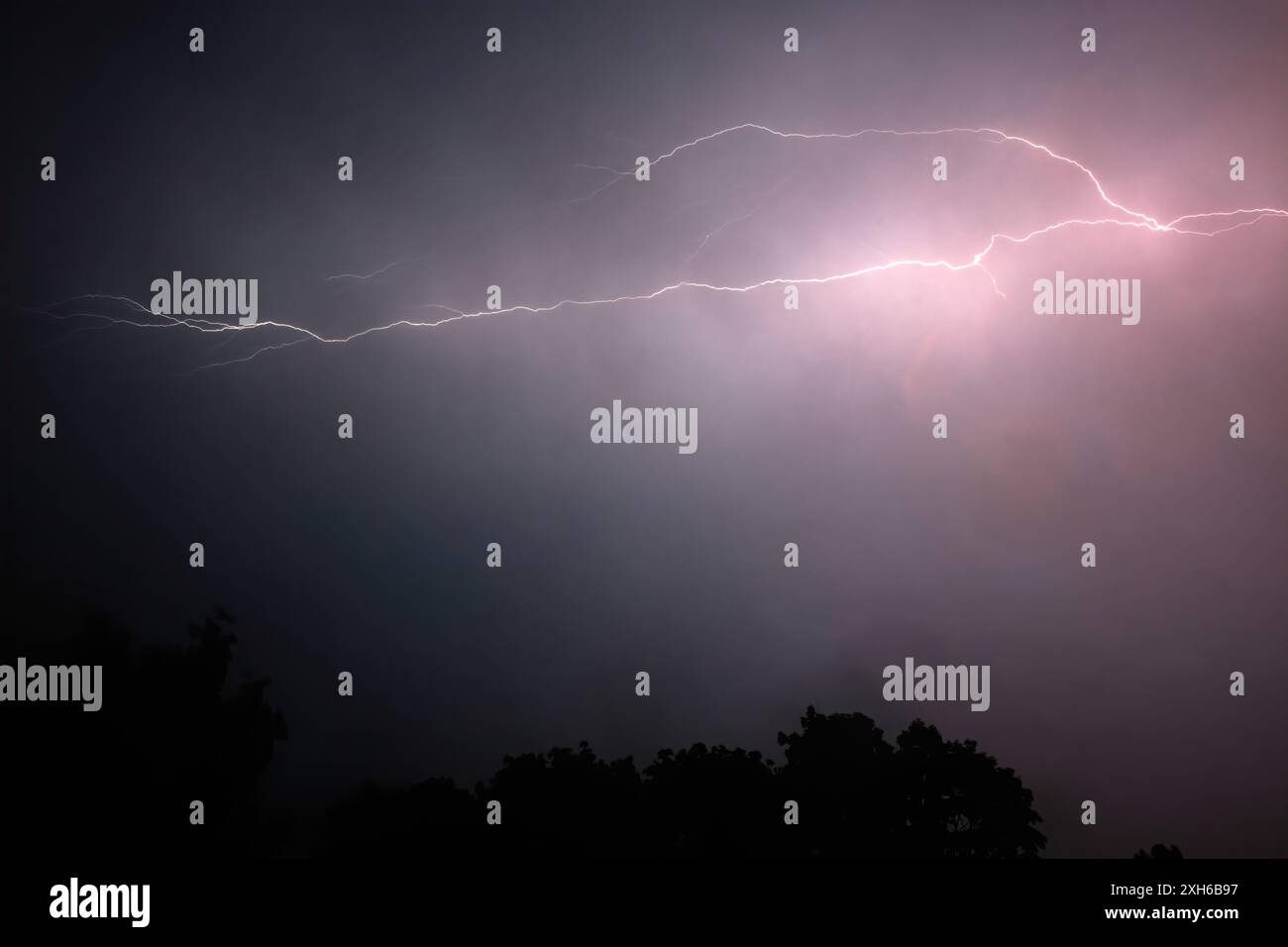Lightning Storm. A dramatic lightning storm in the night sky with ...