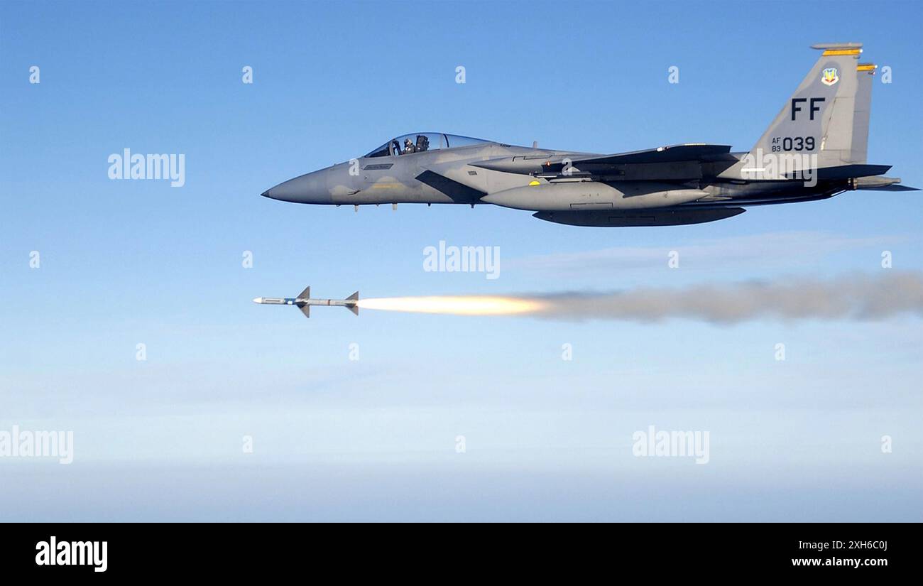 USAF F-15 Eagle firing an AIM-7 Sparrow medium range air-to air missile in 2005. Stock Photo