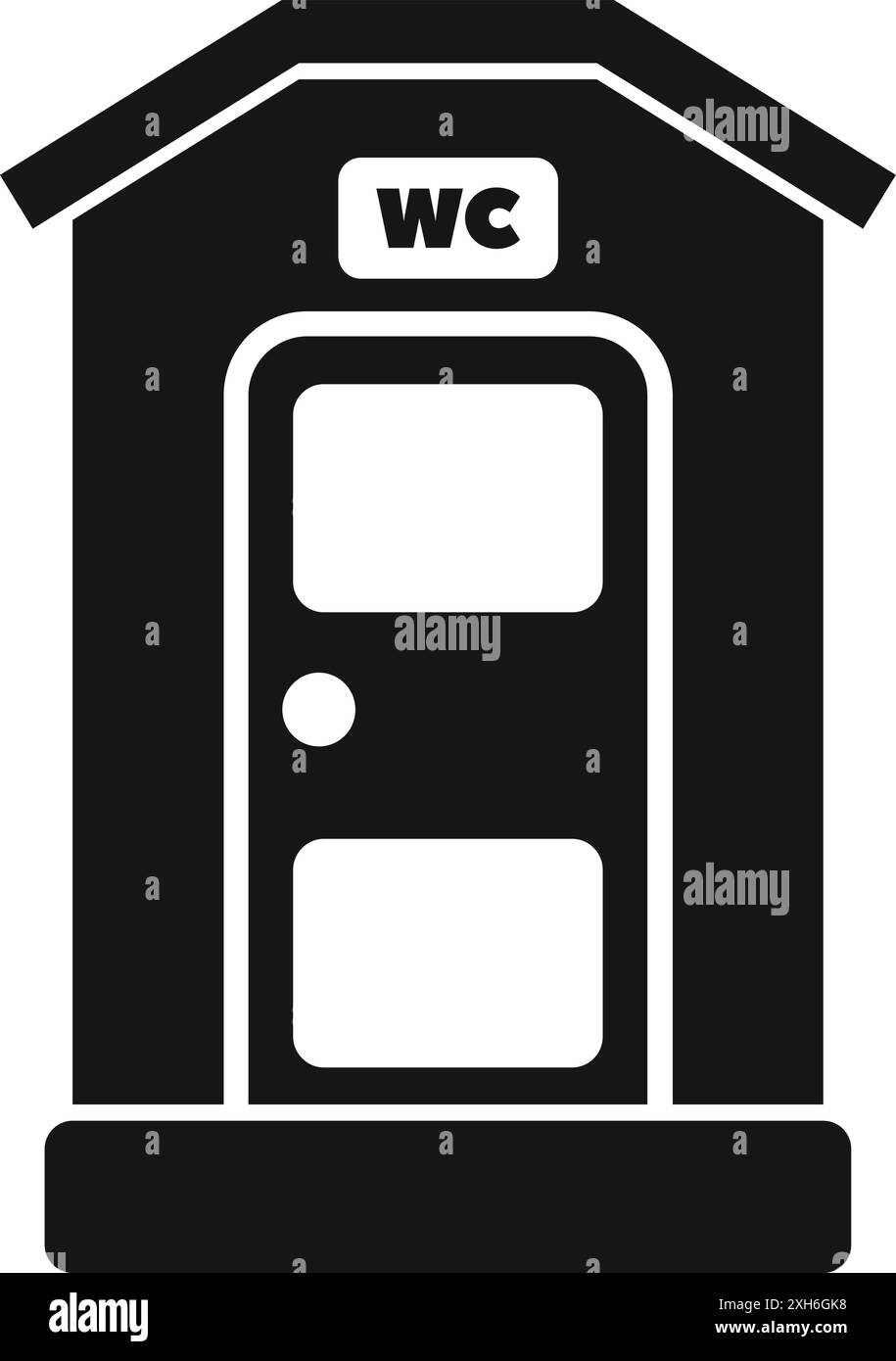 Public toilet building featuring wc sign on top representing a place