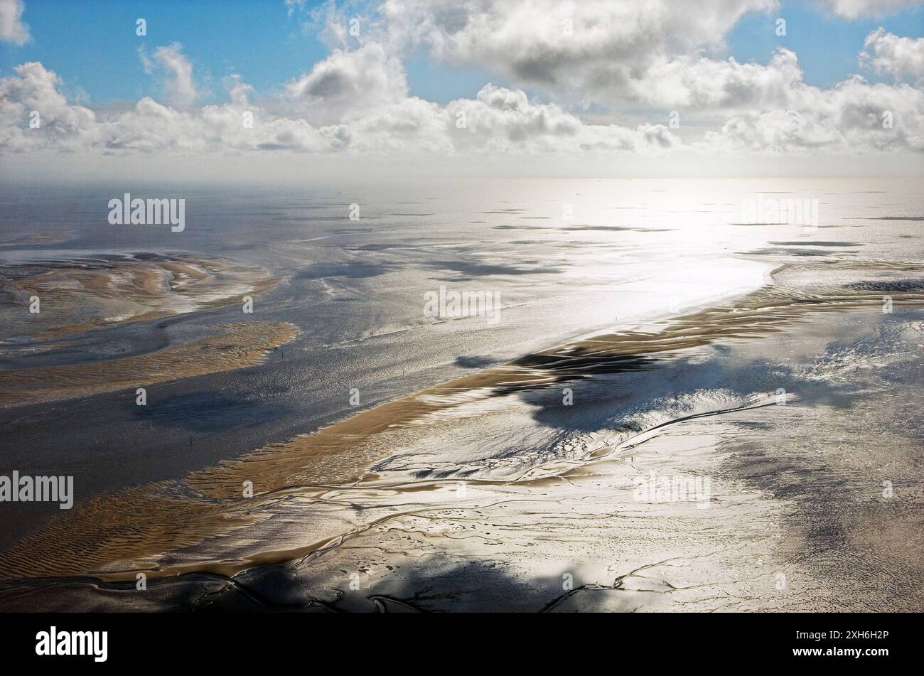 Morecambe Bay showing tidal mudflats northwest of Lancaster, Lancashire, England.  Looking southwest. Aerial Stock Photo
