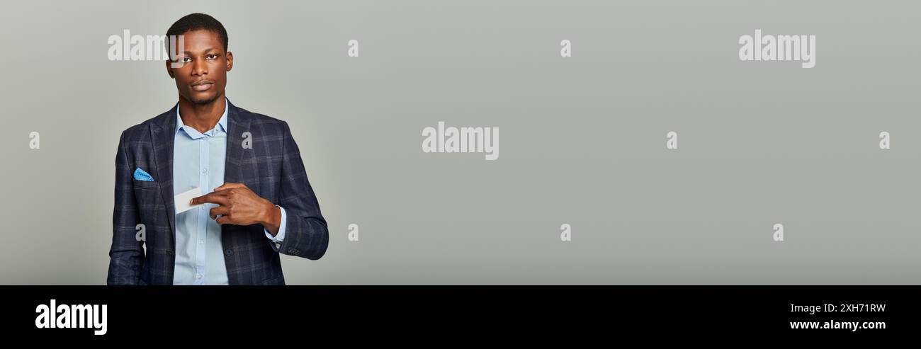 Young man in formal attire poses confidently hi-res stock photography ...