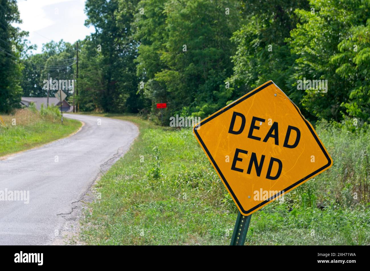 Yellow Dead End sign with copy space to the left Stock Photo