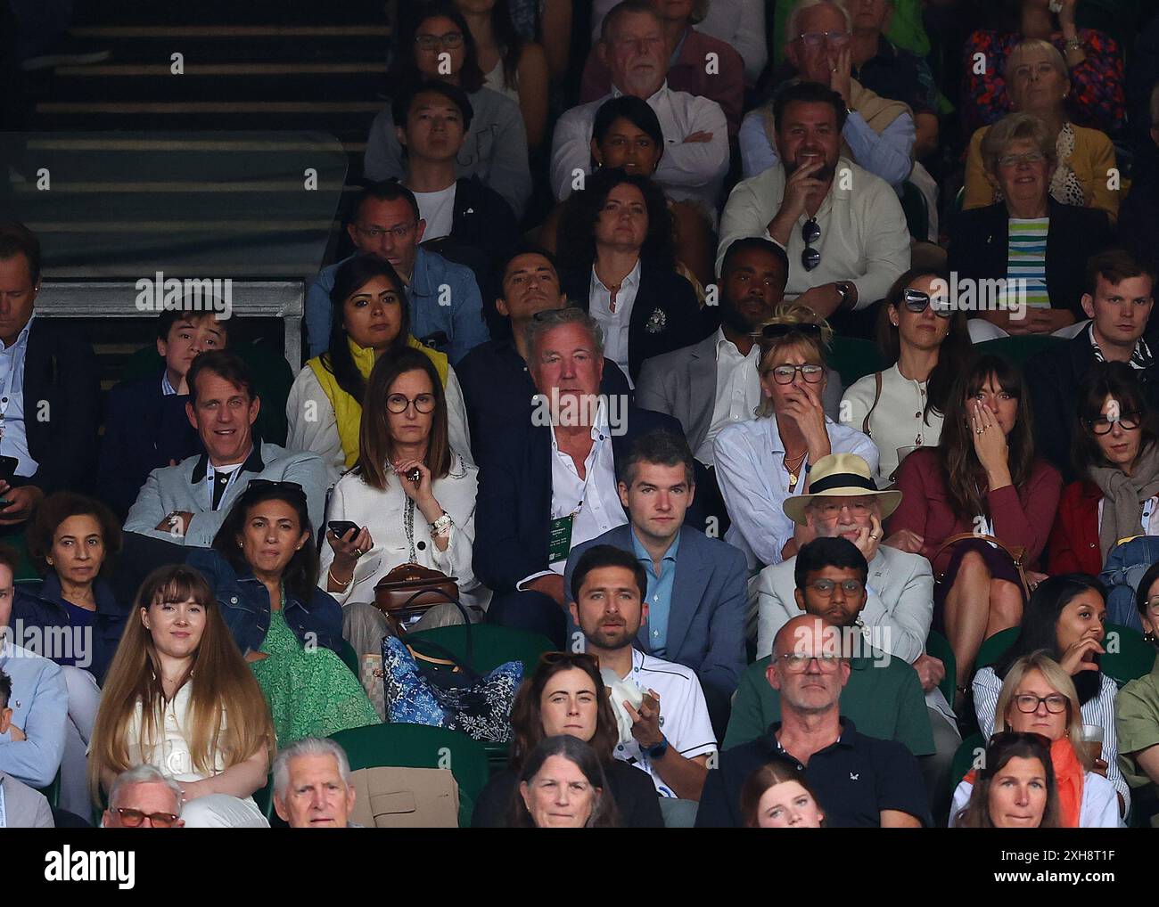 London, UK. 12th July, 2024. 12th July 2024; All England Lawn Tennis and Croquet Club, London, England; Wimbledon Tennis Tournament, Day 12; English television presenter, journalist, and writer Jeremy Clarkson sitting next to girlfriend Lisa Hogan in the stands at Centre Court watching Daniil Medvedev (RUS) vs Carlos Alcaraz (ESP), gentlemens singles semi final match Credit: Action Plus Sports Images/Alamy Live News Stock Photo